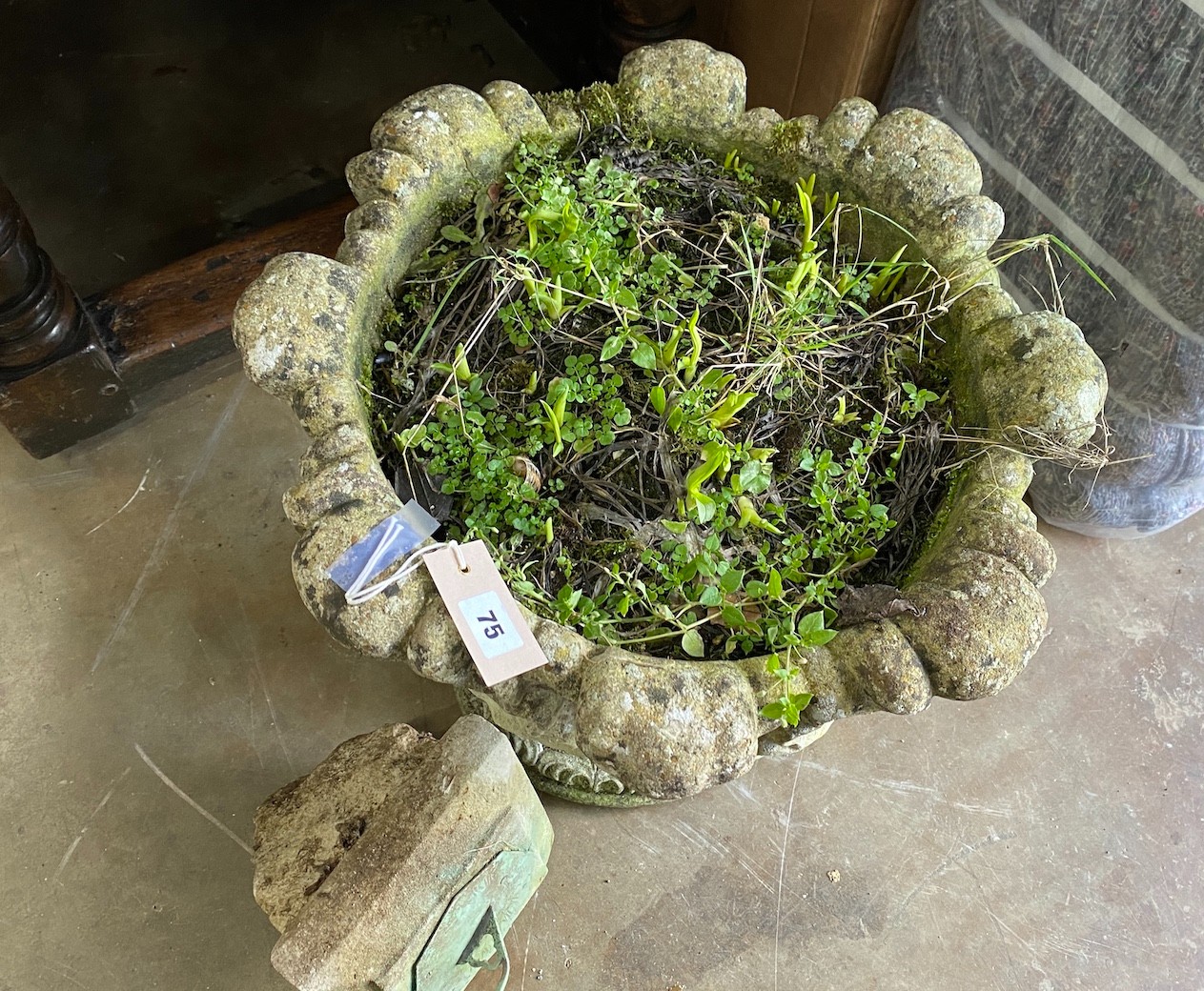 A reconstituted stone acanthus garden planter, diameter 48cm, height 50cm together with a sun dial section